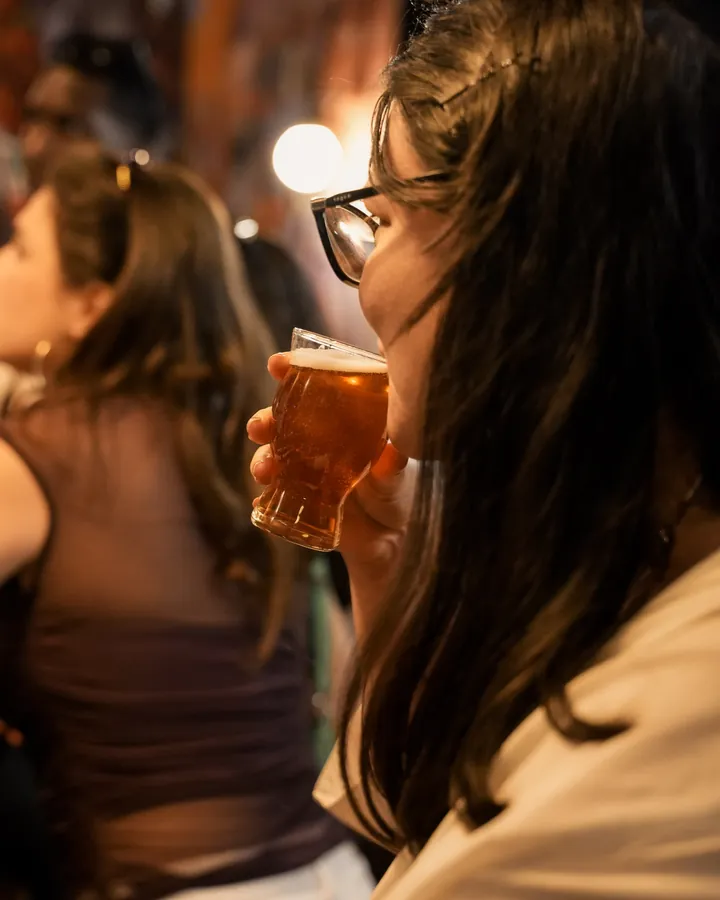 Guests tasting beer at the bar counter