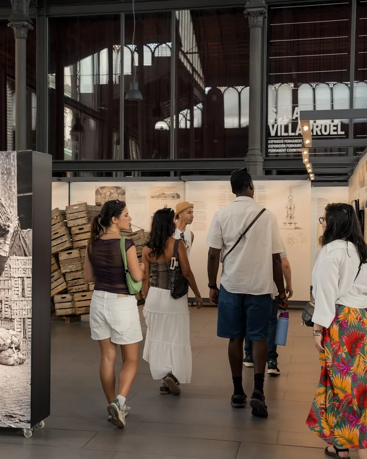 The group visiting a market exhibition